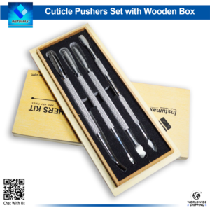 Professional 4-piece stainless steel cuticle pusher set organized in a wooden storage box.